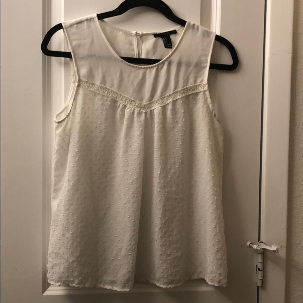 Sheer sleeveless blouse